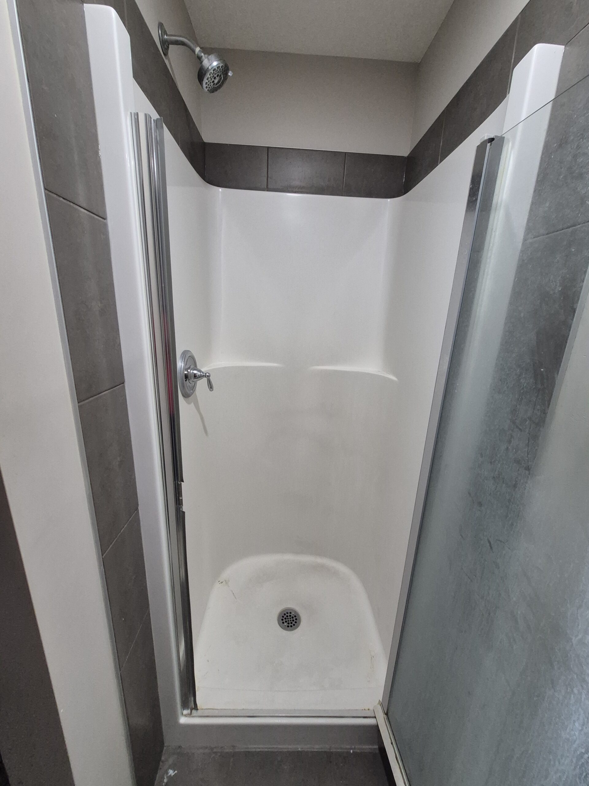 Before: stained shower base