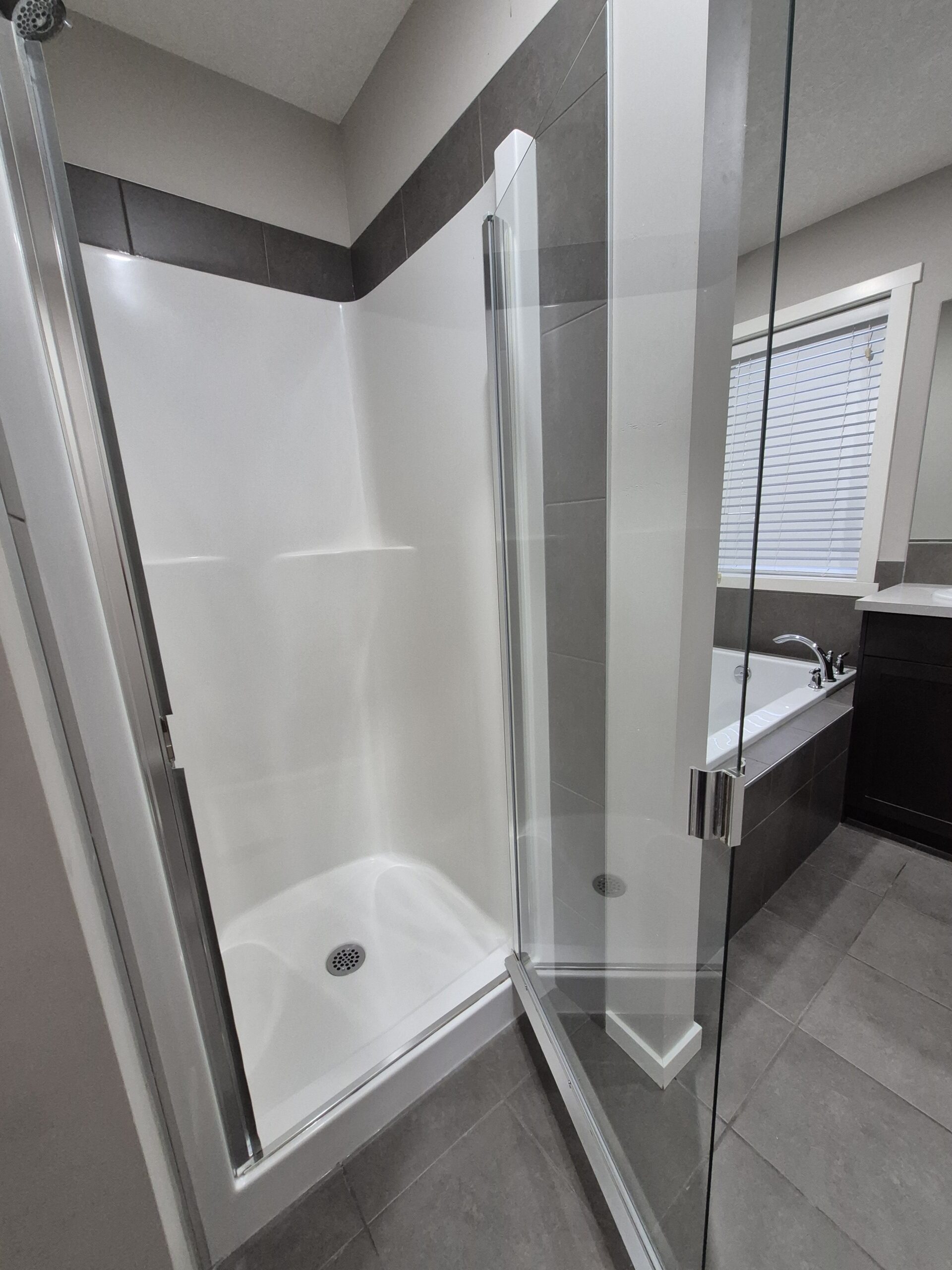 After: bright, spotless shower base